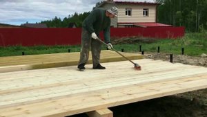 Одноэтажный дом 9х12 м. Обвязка свай и лаги пола.