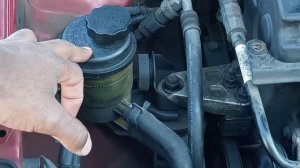 Step by step guid to servicing power steering fluid on a 2006 kia spectra 2.0