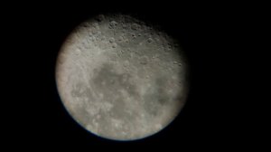 Moon through my phone and cheap telescope f70060