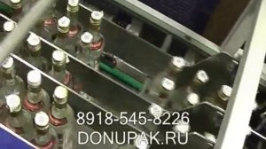 комплекс для упаковки бутылок на картонной подложке в термоусадочную пленку