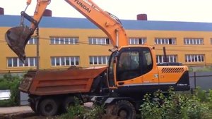 Аренда колесного экскаватора
