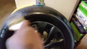 chemical guys black wet look tire shine applied with paint brush