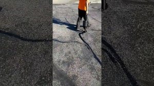 Hot rubber asphalt crack sealing