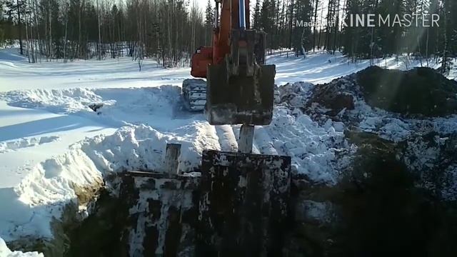 Работа машиниста экскаватора на севере.