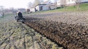 Вспашка двухкорпусным плугом