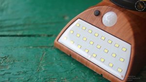 Фонарь, часы на солнечной батарее