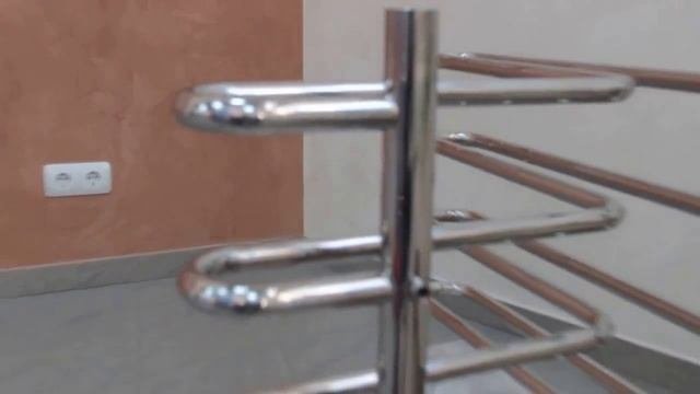 Угловой полотенцесушитель Nika.