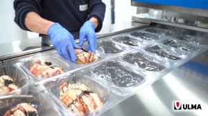 Упаковка крабов на термоформере ULMA TFS 600