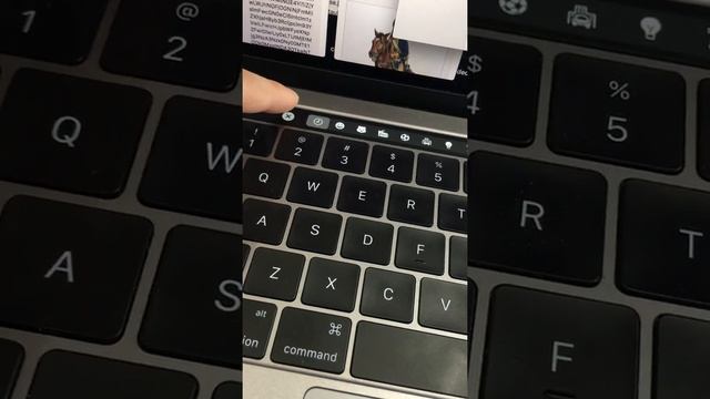 How to access the emoji keyboard on Mac Book Pro (touch bar)