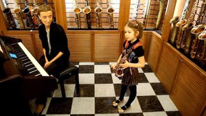 Santa Lucia played on saxophone by a 7 years old girl