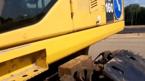 Колёсный экскаватор Komatsu PW 160. Стрела 13 метров. Аренда и услуги спецтехники «Мамонт».