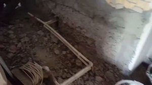 Демонтаж выступающей бетонной части стены.