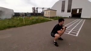 Приседания с гирей на груди