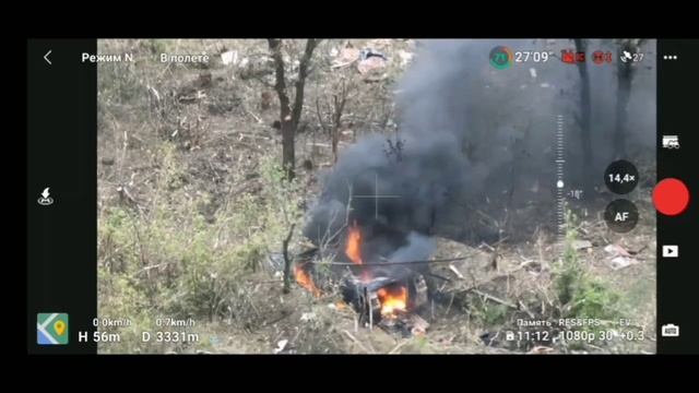 Кадры уничтожения БТР М-113 и автомобиля ВСУ огнем подразделений НМ ДНР в районе Донецкого аэропорта