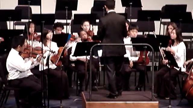 Isabel Casillas with Violin playing in the hall of  the mountain king