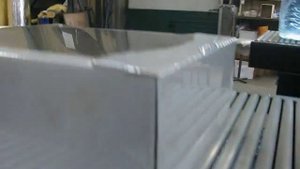 Упаковка увеличенных кондитерских коробок(телевизоров).