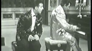 Liberace performing Night and Day and There'll Be No New Tunes On This Old Piano
