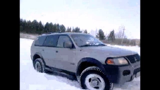 Митсубиси Монтеро спорт (тест режима AT/MODE) в снегу в гору смотреть онлайн