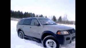 Митсубиси Монтеро спорт (тест режима AT/MODE) в снегу в гору