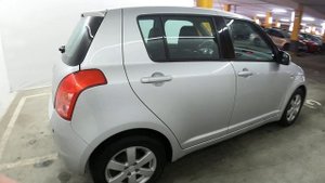 Suzuki Swift III 1.2 MT (75 л.с.) 2009