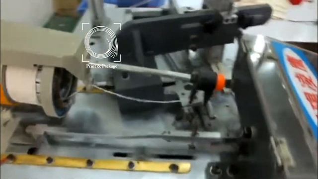 Автоматическая машина по завязыванию подвесов на ярлыки смотреть онлайн