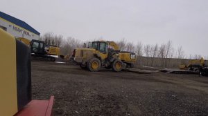 SHAKE IT OFF: Loader's forks get stuck inside a mat