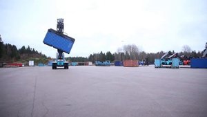 Спредер с функцией наклона для разгрузки контейнеров с сыпучим грузом