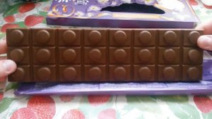 Шоколад Milka "Цельный орех и карамель"