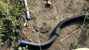 Протяжка кабеля витой пары через водопроводную трубу 75м.