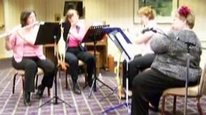 Scott Joplin's "The Entertainer" played by flute quartet