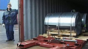 загрузка  рулонной стали в контейнер