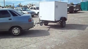 легковой прицеп термобудка и промтоварный.