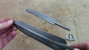 Кованое перо птицы.