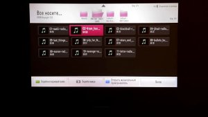 Кинотеатральный DLP-проектор LG PF1000U со встроенным ТВ-тюнером