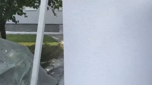 Нанесение специального керамического утеплителя на фасад дома из пеноблоков