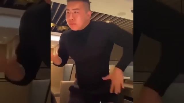 chinese man gets angry and then dances