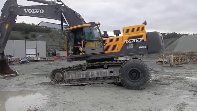 Как переобуть экскаватор? Мегамашины - смотреть видео онлайн от ...