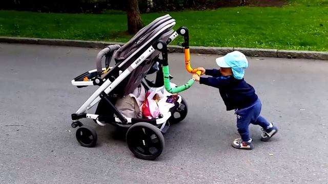 14 Months Old baby goes for a walk, riding his own stroller смотреть онлайн