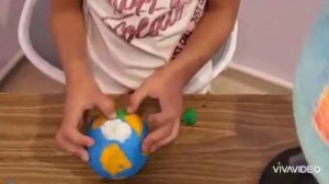 Модель Земли из апельсина и пластилина от Диди.