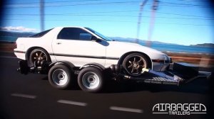 Низкорамный прицеп для перевозки легкового автомобиля