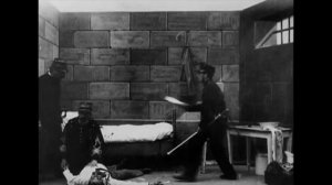 The Dreyfus Affair (1899) by Georges Méliès, Clip:Suicide of Colonel Henry and shooting of Labori..