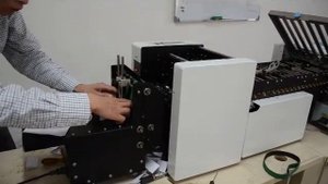 Фальцовщик для инструкций и руководств Sunfung - пример работы.