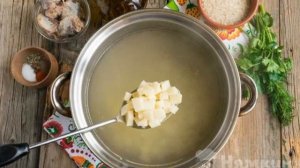 Fish soup on chicken broth with rice