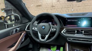 Перетяжка потолка BMW X6, покраска потолочного пластика, перетяжка руля, реставрация кожи