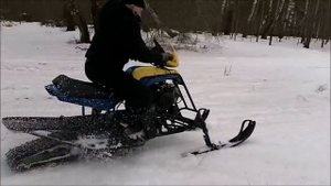 два самодельных снегохода с катковой подвеской гусеницы