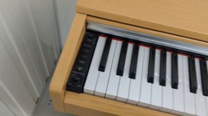 Yamaha Arius YDP-141c digital piano in cherry wood / light oak finish. stock number 23365