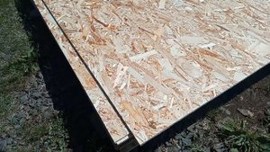 Зашиваем фронтоны дома.