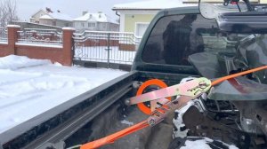 Автоматическая стяжка для груза
