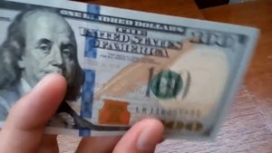 Как выглядит новая 100 долларовая купюра