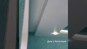 Двухуровневый натяжной потолок с подсветкой в гостиной